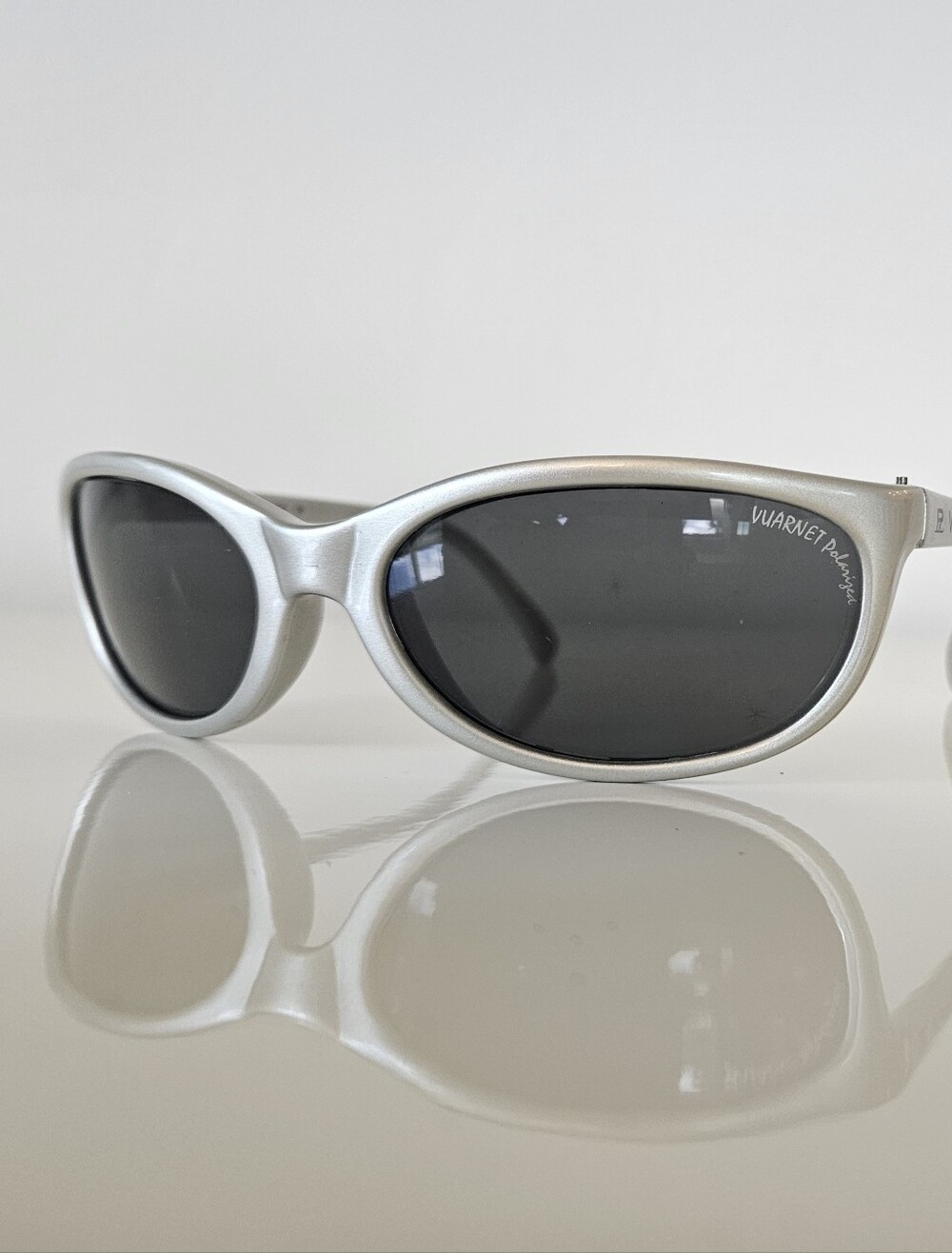 Vuarnet Silver Oval Sunglasses with Dark Lenses